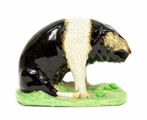 A John Jackson ceramic saddle back pig, height approx. 12cm.