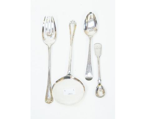 Four silver pieces including a Georgian London silver spoon, Victorian London silver spoon and London silver serving fork and