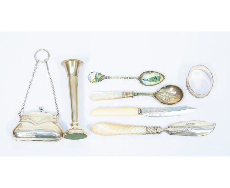 A filled silver&nbsp; vase, silver purse, napkin ring and enamelled spoon. Butler knife blade with Mother of pearl handle, kn