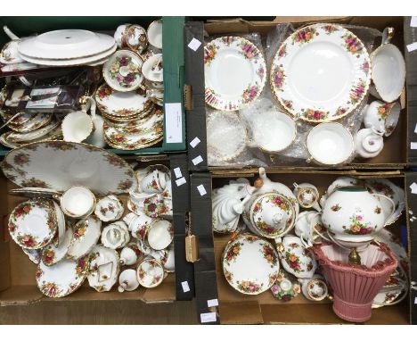 A large collection of Royal Albert Old Country Rose tea wares, plates, lamp, flatwares, and others various. (Q)