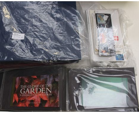 Stamps- A collection of mint GB stamps and first day covers. To include 1985 Yearbook, various presentation packs and 15 book