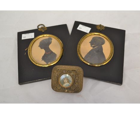 Two 19th Century silhouettes and small white metal pill box with miniature portrait
