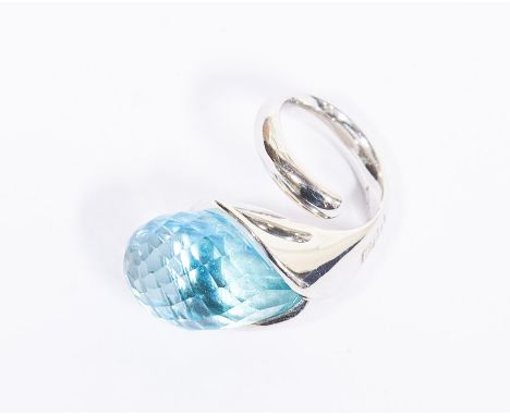 A silver and blue paste set ring, the organic extendable coil mount set with a large briolette stone, stone size approx. 22mm