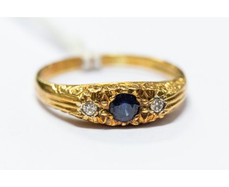 An early 20th century 18ct yellow gold sapphire and diamond ring, size P, total gross weight approx 4.3gms