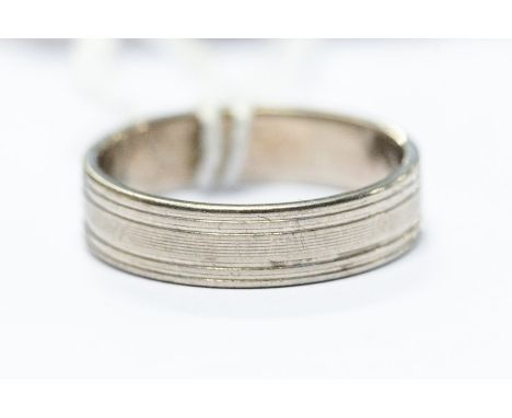 A gentleman's 18ct white gold wedding band, ring size P, 5.3 grams approx