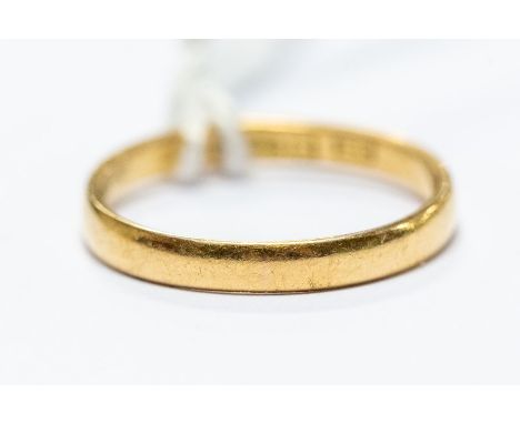 A 22ct gold ladies wedding band, ring size M 1/2, 2.43 grams approx