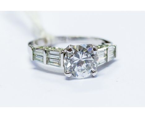 A cubic zirconia and silver dress ring, size L