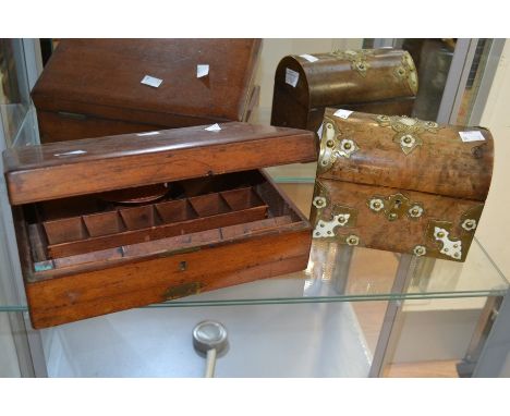 A 19th Century walnut domed tea caddy with brass and ivory strapping, along with a mahogany Victorian vanity box