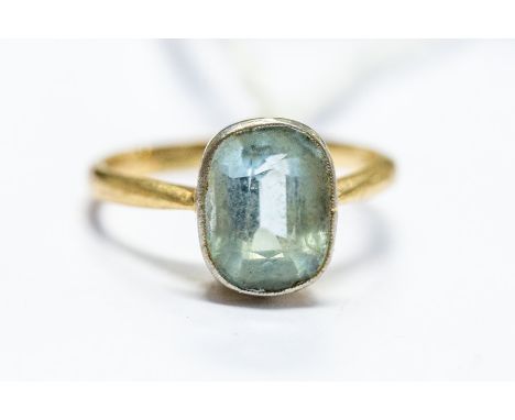 An aquamarine and 18ct gold ring, oval aquamarine rub-over set, size I, total gross weight approx. 2.7gms&nbsp;