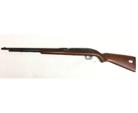 Winchester Model 77 semi auto .22" Rim Fire Long Rifle. Fitted with a tubular magazine.  Serial No 79613. Barrel length 56cm.