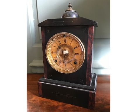 A Victorian black slate bracket clock, circa 1870, of Baroque design, cupola pediment, gilt metal dial with Roman numerals, A