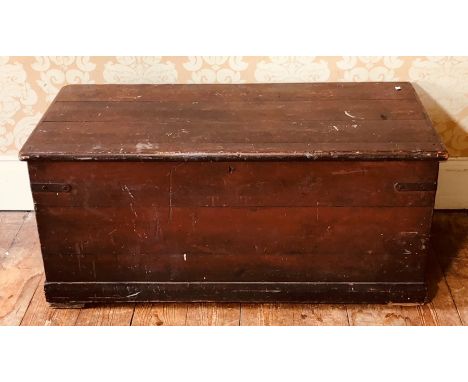 A 19th century grained pine blanket chest, three panel lid, rope side handles, moulded apron, raised on square bracket feet. 