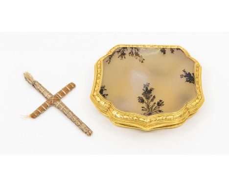A late 18th or early 19th Century pocket snuff box, of cartouche form, polished agate hinged covers, bright cut engraved yell