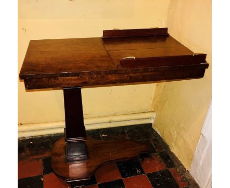 An unusual George III mahogany reading table, circa 1820, in form of a card table, rectangular top split in one half with a t