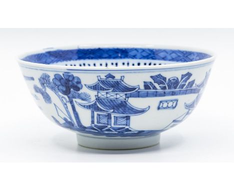 A Chinese blue and white bowl, Kangxi mark but late 19th or early 20th Century, decorated with pagoda river landscapes, blue 