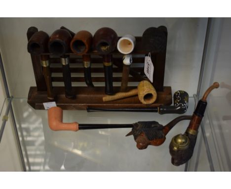 Smoking Interest - a collection of ten pipes, briar and other; a five bar gate pipe rack; etc