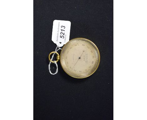 A 19th century gilt brass travelling aneroid barometer, 7cm silvered register inscribed Adie, Broadway, Westminster, 9cm over