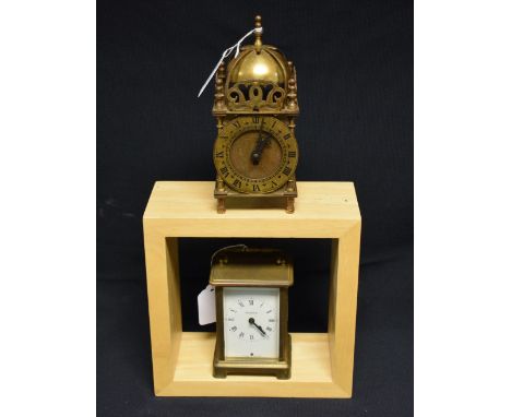 A Smith`s lantern clock; a Bayard carriage timepiece (2) 