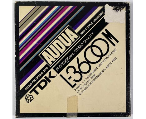 Two reels of audio tape (one reel 10.5" and one 7") with typed tracklisting sheet detailing contents as being recordings of J