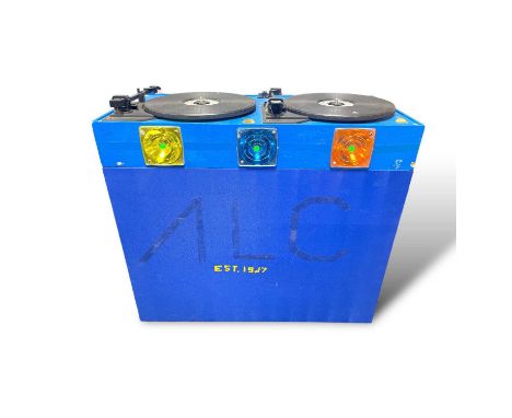 An interesting vintage toy in the form of a full and working pair of turntables built into a wooden frame. With two volume co