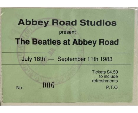 A photo album with 26 fan taken photos (13x9cm) from the 1983 Abbey Road Beatles exhibition. With ticket.