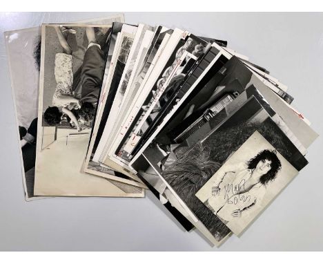 A collection of 52 original press photographs, variously sized though many 8x10", all with press/photographer stamps to verso