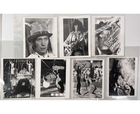 Eight vintage prints (each c9.5x12") each with scenes depicting John Lennon, members of The Rolling Stones, The Who and anoth