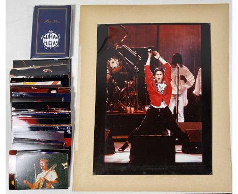 A good selection of Duran Duran images to include: large format glossy print of SLB on stage (12x16"), likely approx 150 colo