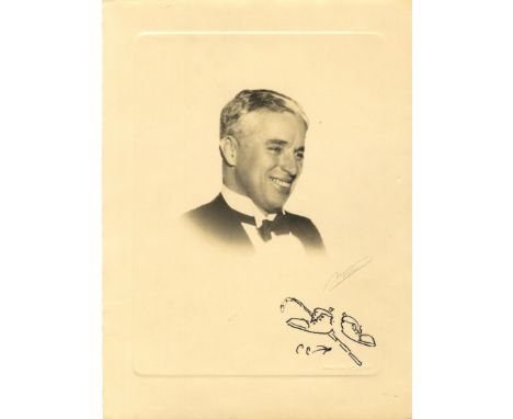 CHAPLIN CHARLES: (1889-1977) English Film Comedian, Academy Award winner. A good vintage signed sepia 7 x 9.5 photograph of C