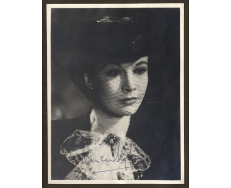 ENTERTAINMENT: An oblong 4to photograph album containing over 30 vintage signed postcard photographs (a few smaller and large