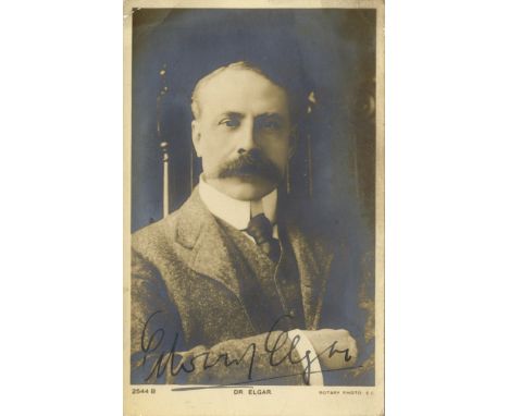 ELGAR EDWARD: (1857-1934) English Composer. Vintage signed postcard photograph of Elgar seated in a half length pose. Signed 