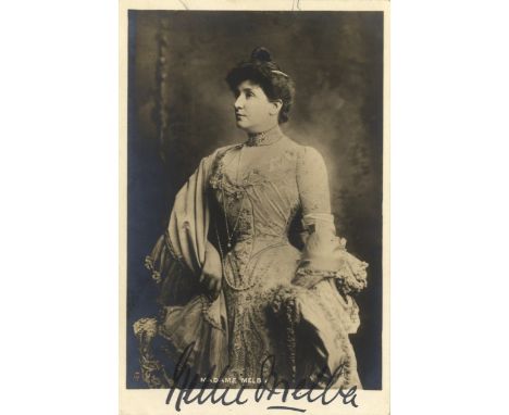 MELBA NELLIE: (1861-1931) Australian Soprano. Vintage signed postcard photograph, an attractive image of Melba standing in a 
