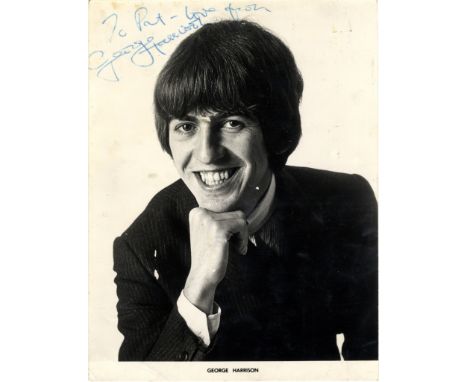 HARRISON GEORGE: (1943-2001) English Guitarist, a member of The Beatles. Vintage signed and inscribed 6.5 x 8.5 photograph of