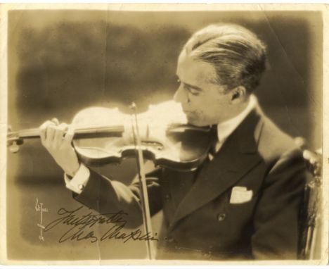 CHAPLIN CHARLES: (1889-1977) English Film Comedian, Academy Award winner. Vintage signed sepia 10 x 8 photograph, the image s