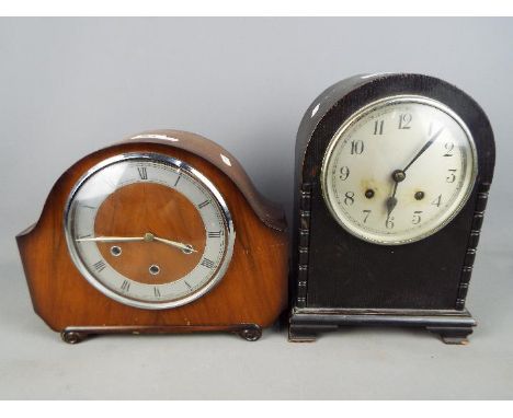 An arch top mantel clock with Arabic numerals to the dial, with key and pendulum and a further mantel clock, Roman numerals t