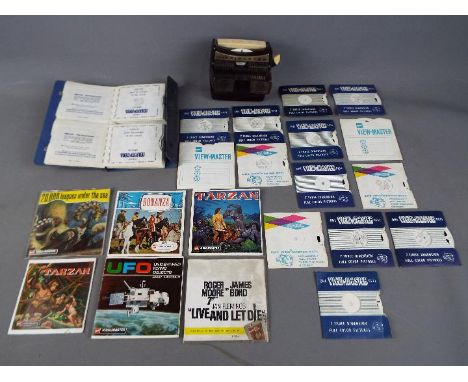 A vintage Sawyer's View Master with in excess of 50 slide reels.