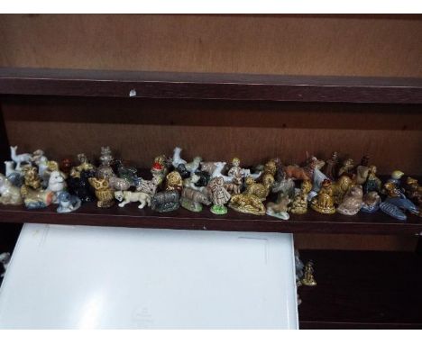 Wade - A collection of Wade Whimsies and similar figures, approximately 80 pieces.
