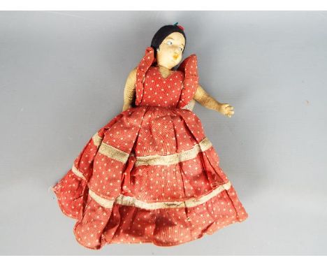 Lenci topsy turvy doll in traditional Spanish costume, Italian, circa 1930. Two linen covered wooden heads and stuffed body. 