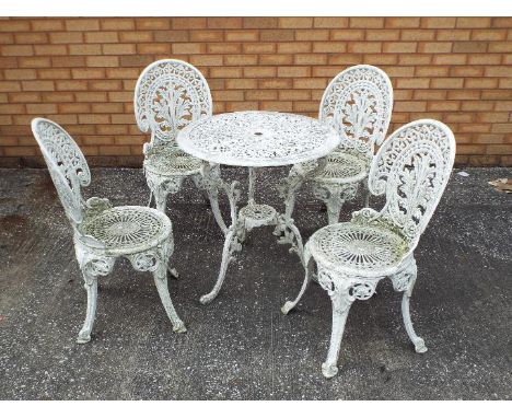 A vintage painted metal garden table and four chairs, table approximately 70 cm (h) and 68 cm (d). [5]