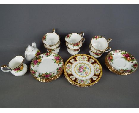 Royal Albert - Nineteen pieces of Royal Albert 'Old Country Roses' comprising cups, saucers, side plates and cream jug, also 