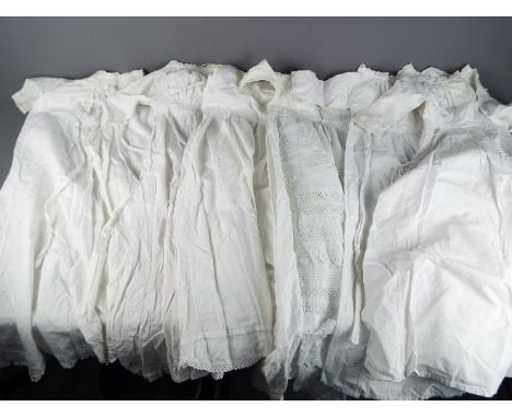 Six vintage Christening gowns.
