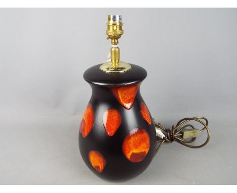 A Poole Pottery lamp base in the 'Galaxy' pattern, approximately 36 cm to top of fitting.