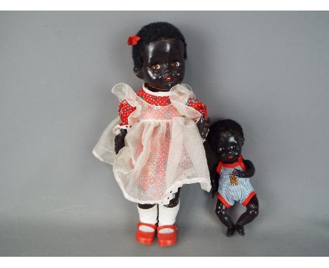 Pedigree Dolls - a Pedigree black Americana girl doll marked to the head Pedigree with non-working crier, jointed arms and le