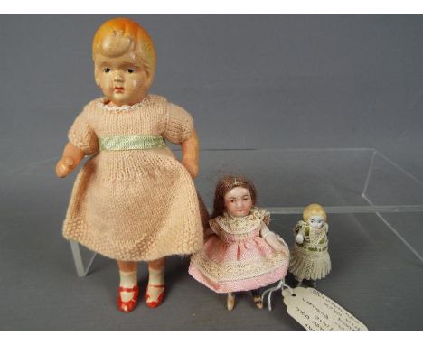 German Doll House Dolls - a German Doll House doll with ceramic painted face, real human hair, jointed arms and legs with pai