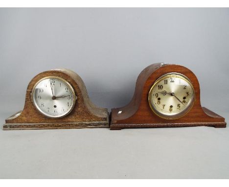 A Napoleons hat mantel clock with carved detailing, Arabic numerals to the dial, with pendulum and a further Napoleons hat ma