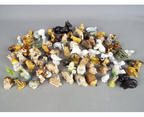 Wade - A collection of Wade Whimsies and similar figures, approximately 80 pieces.