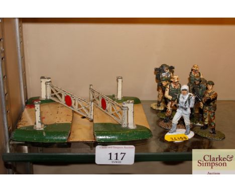 A collection of painted lead model soldiers and a Hornby "OO" tin plate level crossing gate