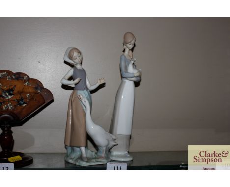 A Lladro porcelain figure of a goose girl and a Nao porcelain figure of a goose girl