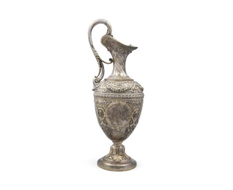 A VICTORIAN SILVER GILT CLARET EWER, London c.1874, maker's mark of Bernard &amp; Sons Ltd., with tall acanthus capped loop h