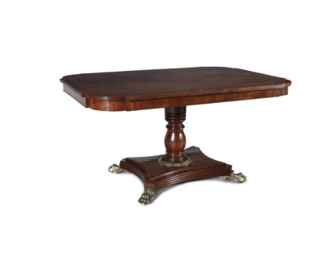 A REGENCY MAHOGANY AND BRASS INLAID TILT-TOP BREAKFAST TABLE, the shaped rectangular top with crossbanded and brass inlay dec